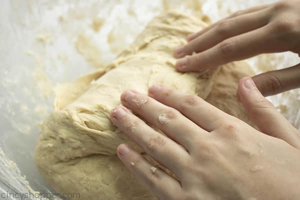 kneading bread dough