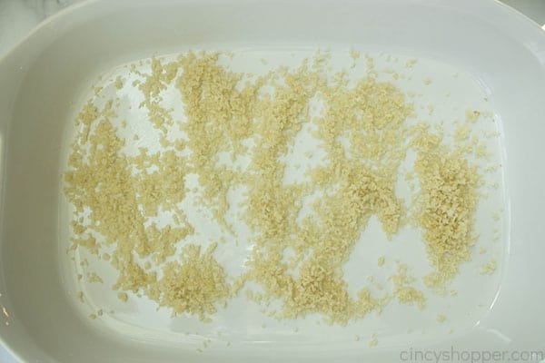 breadcrumbs sprinkled inside a white baking dish
