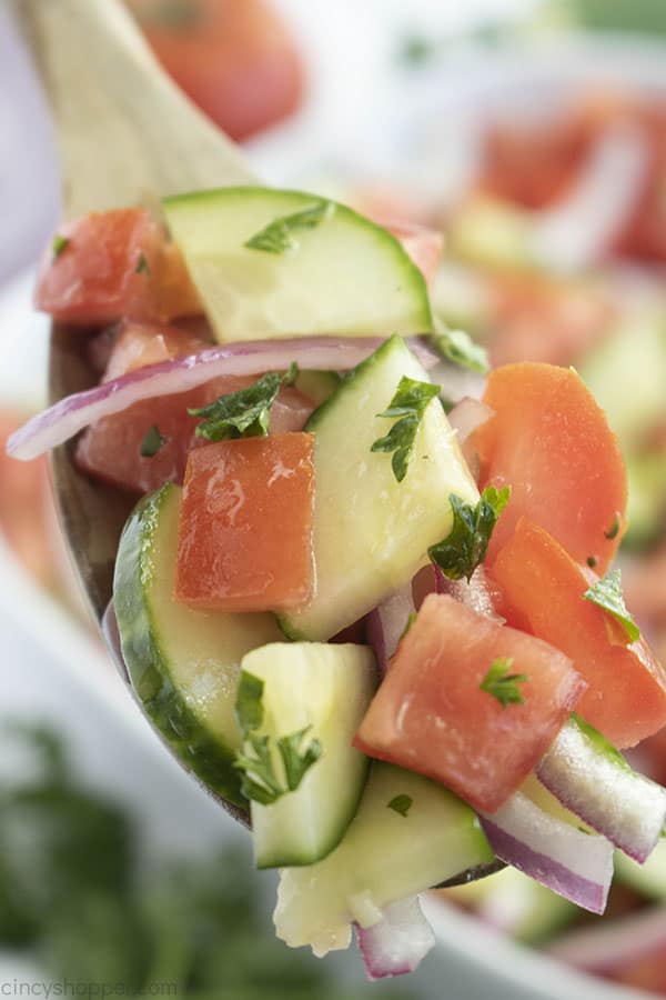 vegetable salad on a wooden spoon