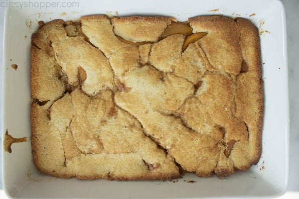 Baked Peach Cobbler in white baking dish