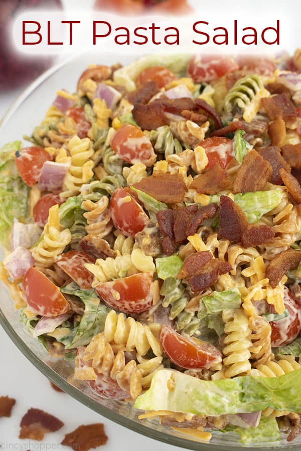 Bowl of cold pasta salad titled BLT Pasta Salad