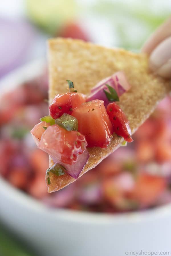 Close shot of easy salsa on tortilla chip