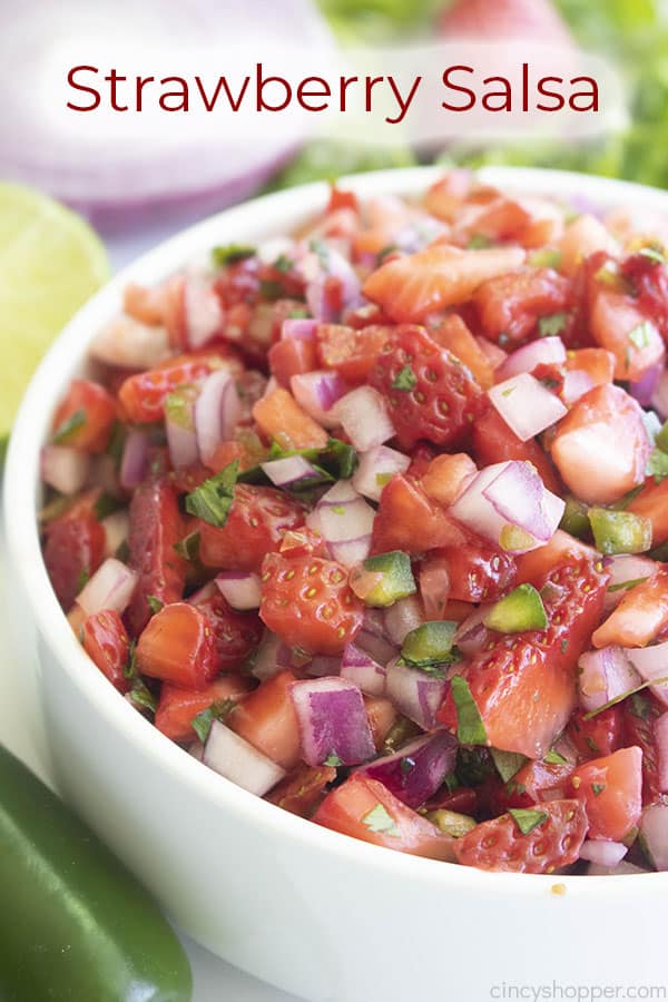 White bowl full of freshly-made salsa, text on image: Strawberry Salsa