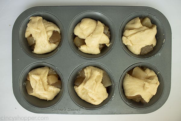 Crescent rolls folded over in muffin tin