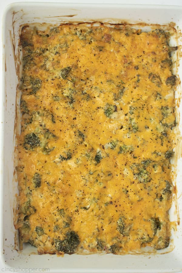 Broccoli Casserole with cheese in a white baking dish
