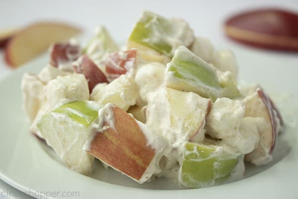 Plated close up shot of Creamy Apple Salad on a small white plate 