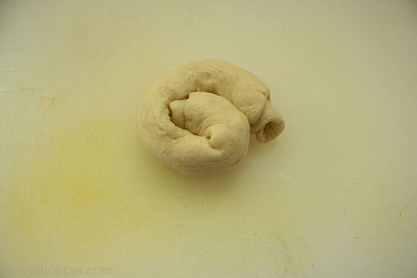 Rolled crescent on a white cutting board