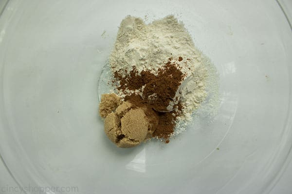Dry spices from ingredient list for topping in a clear bowl.
