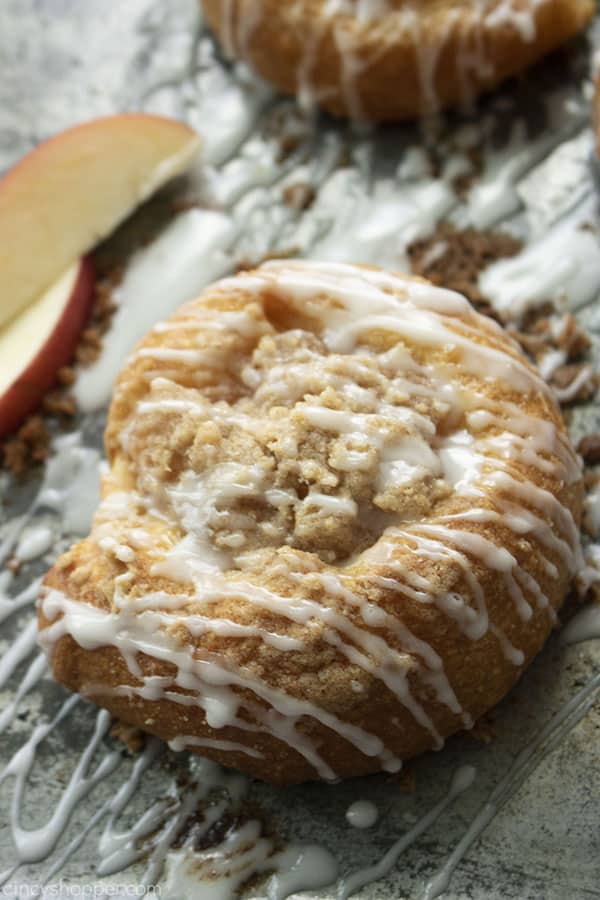 Easy Danish on a pan with lots of icing drizzle plattered.