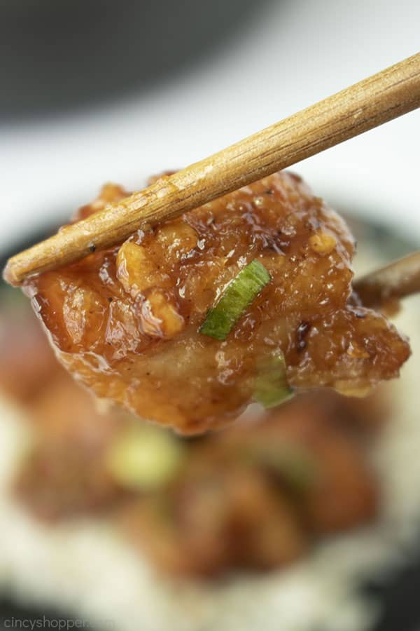 General Tso's Chicken between two chopsticks.