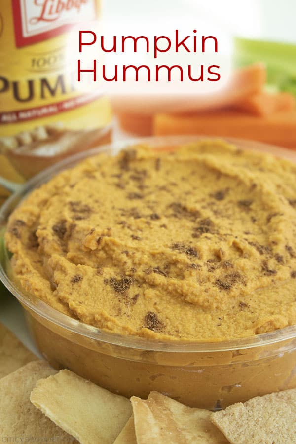 Text on image Pumpkin Hummus a clear dish with carrots, celery, pita chips and canned pumpkin.