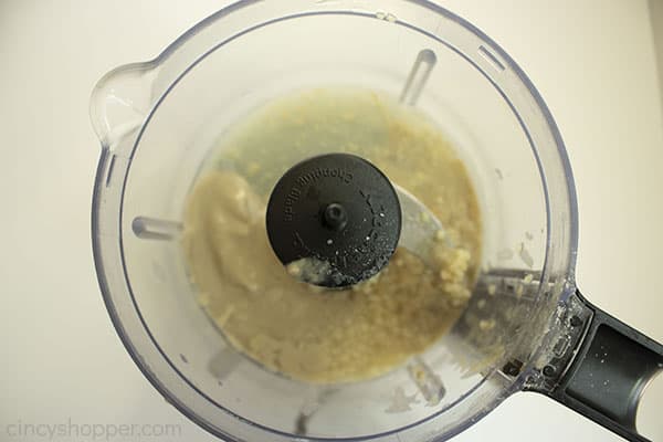 Tahini, garlic, lemon juice, and salt in food processor