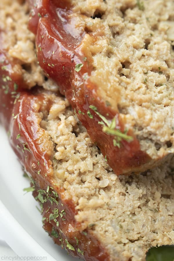Closeup of traditional meatloaf with ketchup glaze closeup. 
