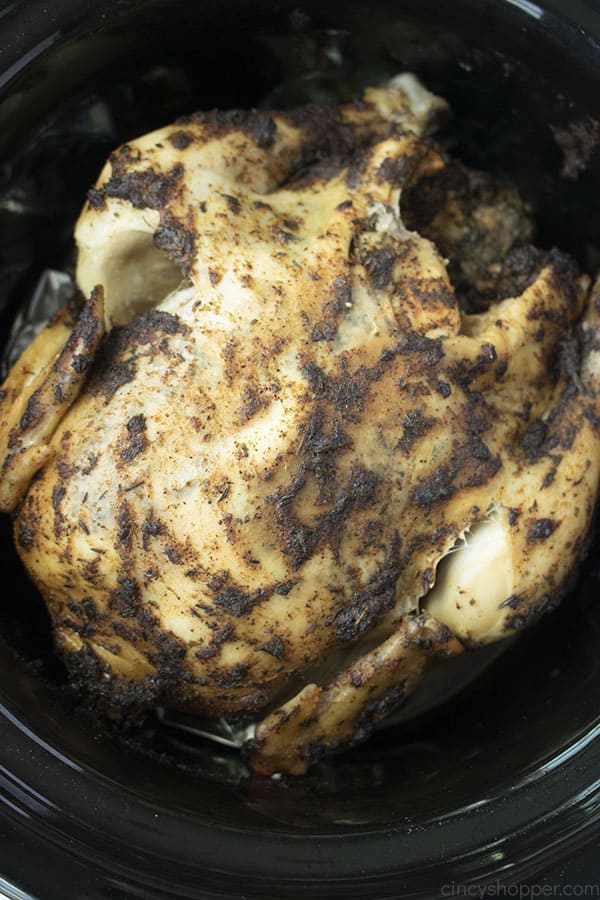 Slow Cooked Rotisserie Chicken in a black Crock-Pot insert