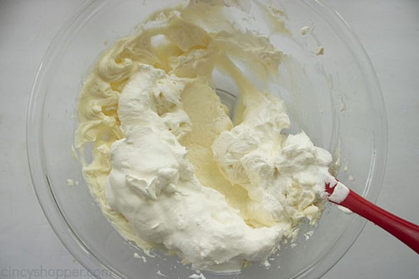 combined whipped cream, cream cheese, and sugar together in a large mixing bowl 