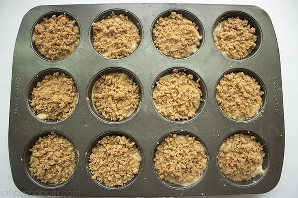 Prepared crumb muffins in a pan