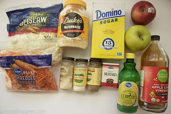 Ingredients for apple slaw salad on a white background