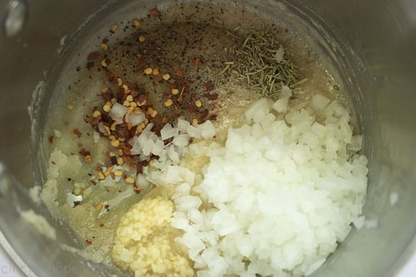 Spices and onion added to roux mixture.
