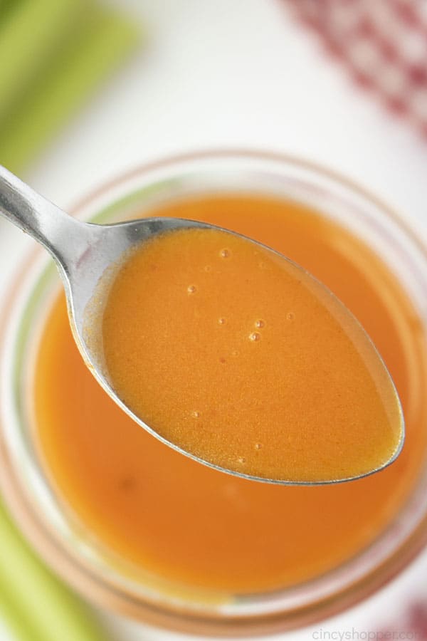 Spoon over top of clear jar with buffalo sauce. 