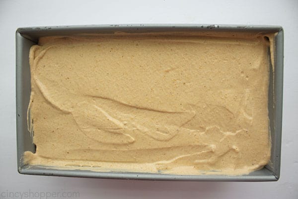 Pumpkin Pie Ice cream in a loaf pan with white background