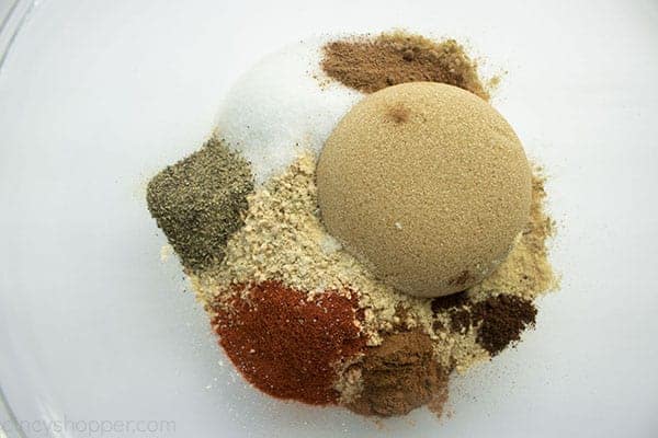 Overhead photo of all the dry ingredients in a large clear bowl