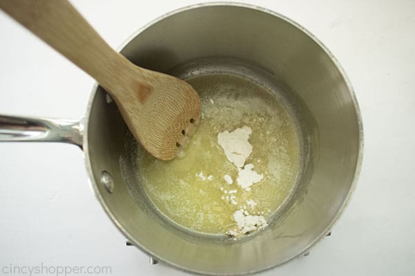 Adding flour to butter