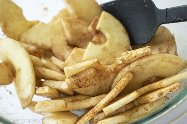 Sliced apples coated in mixture.