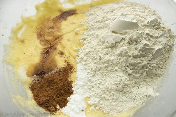 Vanilla and dry ingredients added to cake mixture.