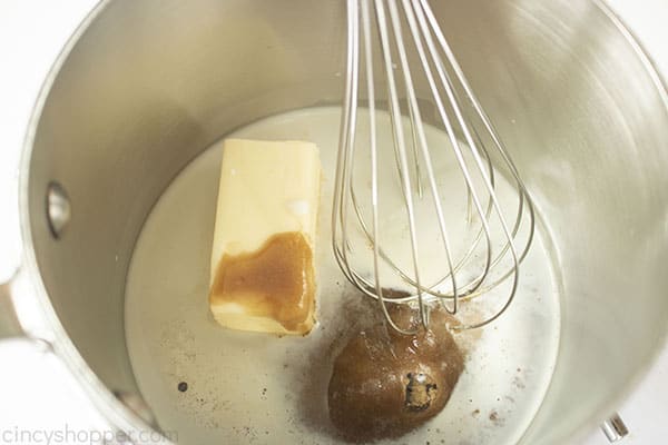 Saucepan with caramel glaze ingredients.