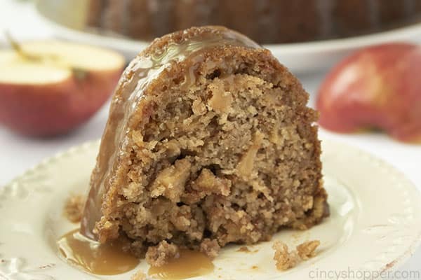 Slice of from scratch apple cake on a plate.