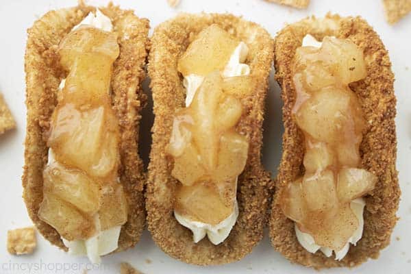 Three finished Apple Cheesecake Tacos