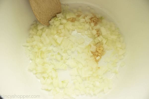 Onions and garlic in a Dutch oven