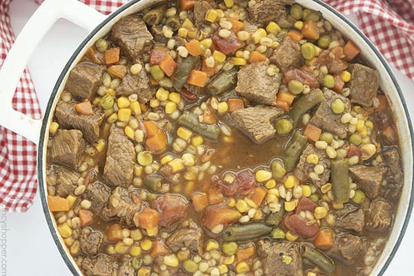 Fully cooked Beef Barley Soup in a dutch oven