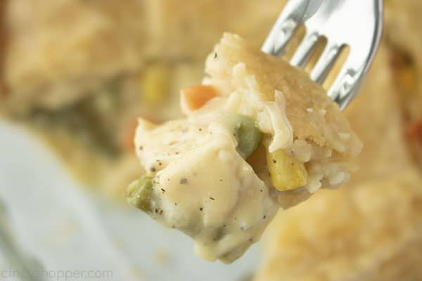 Baked chicken pot pie on a fork.