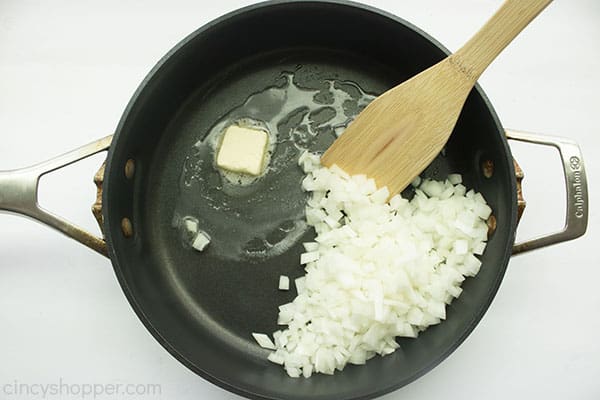 Butter and onions in a fry pan.