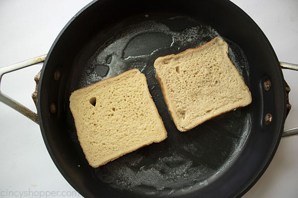 Two slices of French Toast in a frying pan