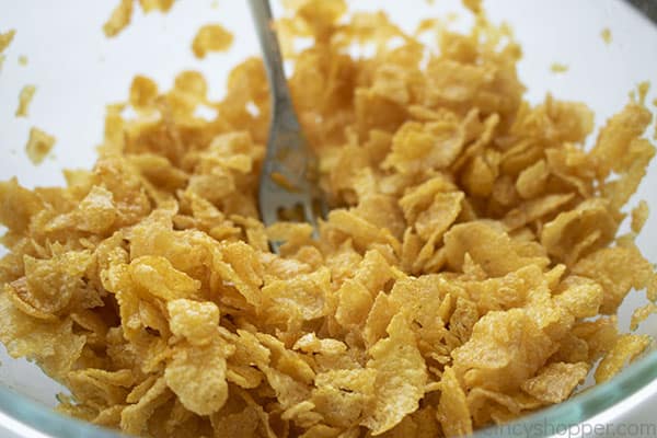 Cornflake mixture in a mixing bowl