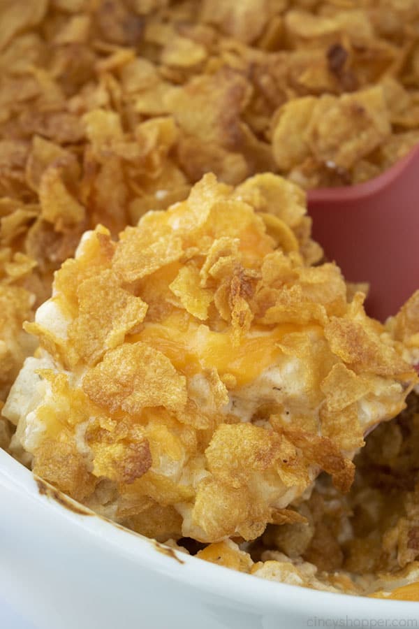 Cheesy Cornflake Funeral Potatoes on a spatula