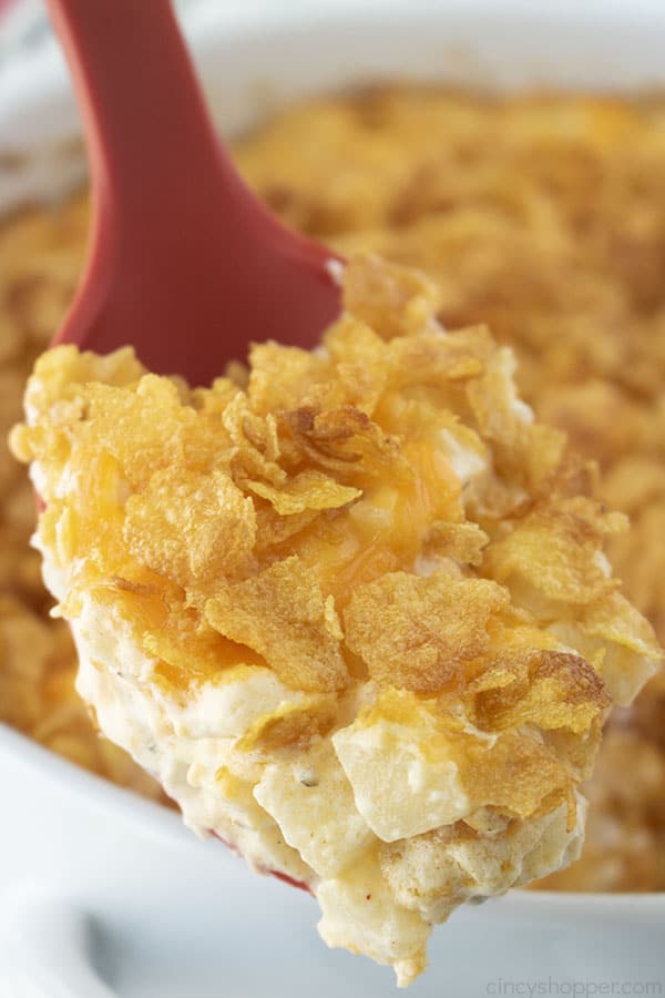 Funeral Potatoes on a red spatula