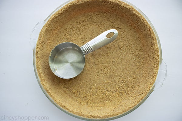 Measuring cup forming pie crust