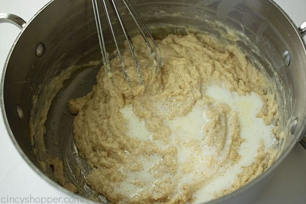 Milk added to roux for macaroni and cheese