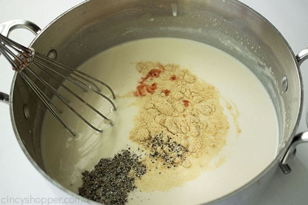 Seasonings added to milk mixture