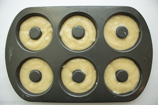 Unbaked batter in donut pan.