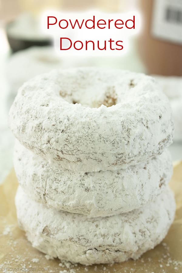 Stack of donuts with text on image Powdered Donuts.