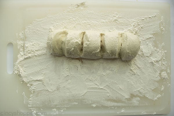 Bread loaf on floured surface