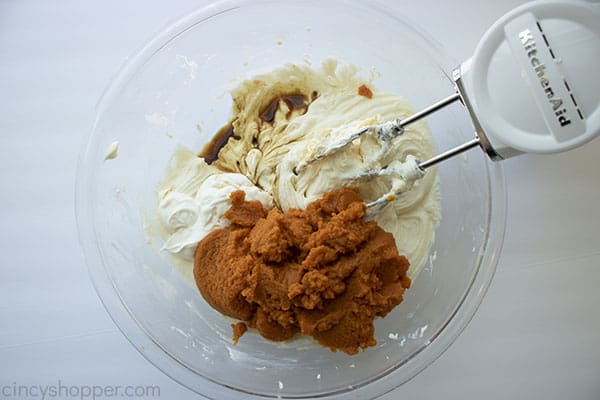 Pumpkin, vanilla, sour cream, pumpkin pie spice added to cheesecake mixture