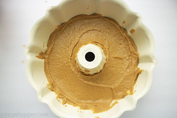 Pumpkin cake mixture added to bundt pan.