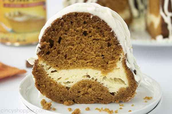 Slice of Pumpkin cake on a white plate.