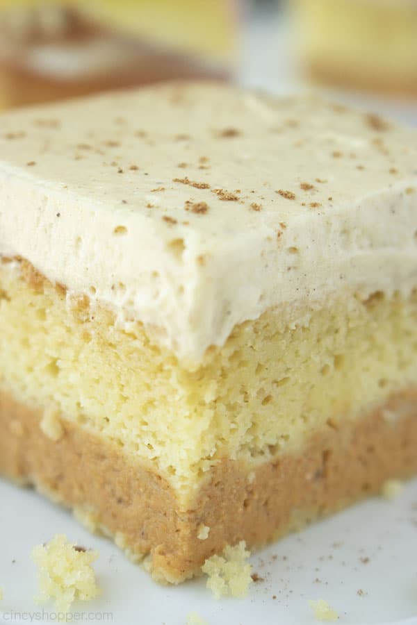 Layered pumpkin cake piece on a plate