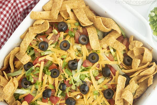 Chips and toppings added to taco casserole
